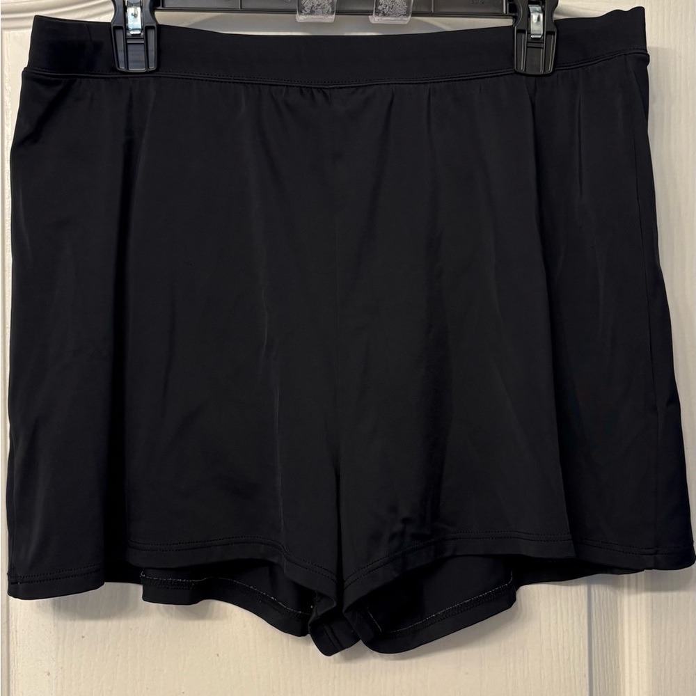 Misses black swim shorts with built-in panty, size 14/16.